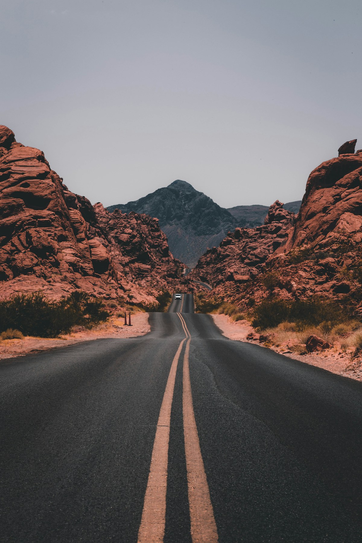 Open road through red rock country representing a retirement planning journey